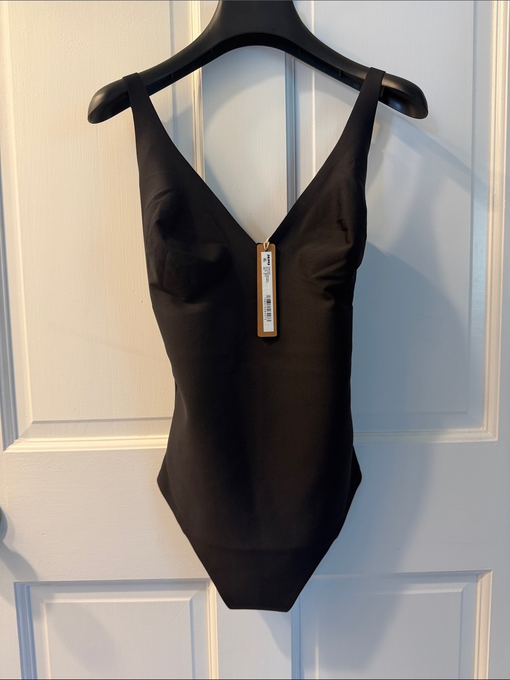 SKIMS Plunge Bodysuit in Onyx
